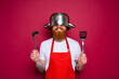 © alphaspirit - happy chef with beard and red apron is ready to cook