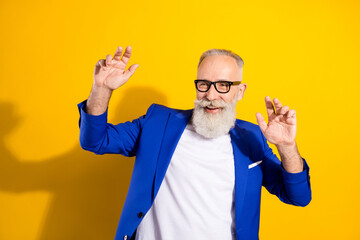 Poster - Portrait of positive aged person enjoy partying look empty space have good mood isolated on yellow color background