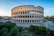 Colosseum in Rome at sunrise, Italy