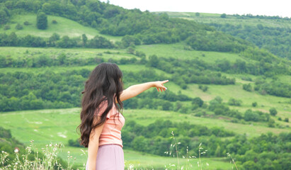 Wall Mural - woman finger show in mountain