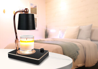 the luxury lighting aromatic scent glass candle is put on the electric lamp candle warmer heater on 