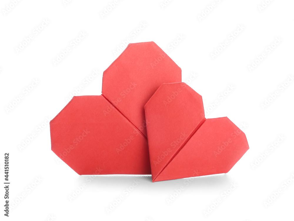 Origami hearts on white background. Concept of uniqueness