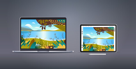 Poster - graphic tablet and laptop with beautiful landscape wallpapers on screens on gray background
