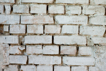 Poster - Abstract old white brick wall. background facade brick wall black and white. Vintage old brick wall texture. Grunge stone wall horizontal background. Dilapidated building facade with damaged plaster.