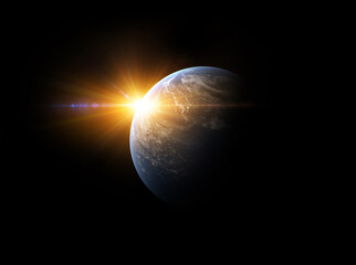 Wall Mural - planet isolated on a black background, sun rising with glow light effects and rays.