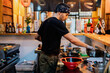 © ADDICTIVE STOCK - Chef cooking in ramen bar