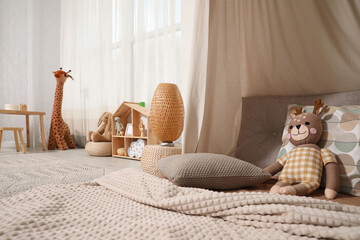 Poster - Cozy kids room with play tent, toys and comfortable floor bed. Montessori interior