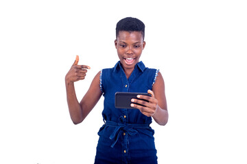 beautiful young woman showing finger during video call on mobile phone smiling.