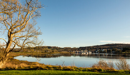 Wall Mural - The River Dee estuary with the fishing town of Kirkcudbright in the background