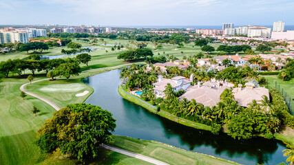 Wall Mural - aerial drone shot of Golf course in Boca Raton, Florida with city