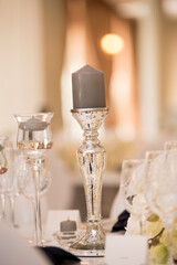 Canvas Print - Wedding table decorated with white flowers and glass candleholders