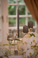 Canvas Print - Wedding table decorated with white flowers and glass candleholders