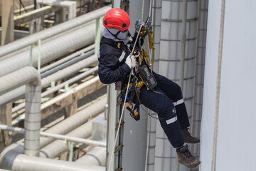 Male worker rope access  inspection