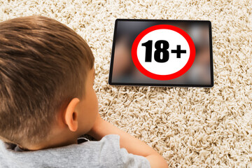 Close-up Of Boy And Digital Tablet