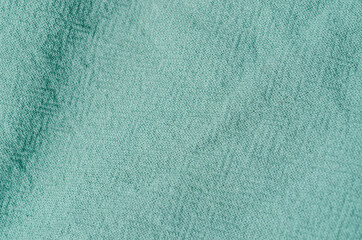 Green cloth texture background.