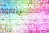 Fototapeta Młodzieżowe - A brick wall in the colors of the rainbow. Concept of LGBT support.