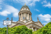 View Over The Gendarmenmarkt In Berlin With German Cathedral In Historical And Business Downtown, Berlin, Germany, At Summer Sunny Day And Blue Sky.