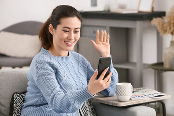 Poster - Young woman taking selfie at home