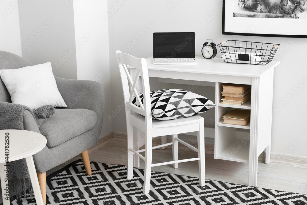 Modern workplace in interior of stylish room