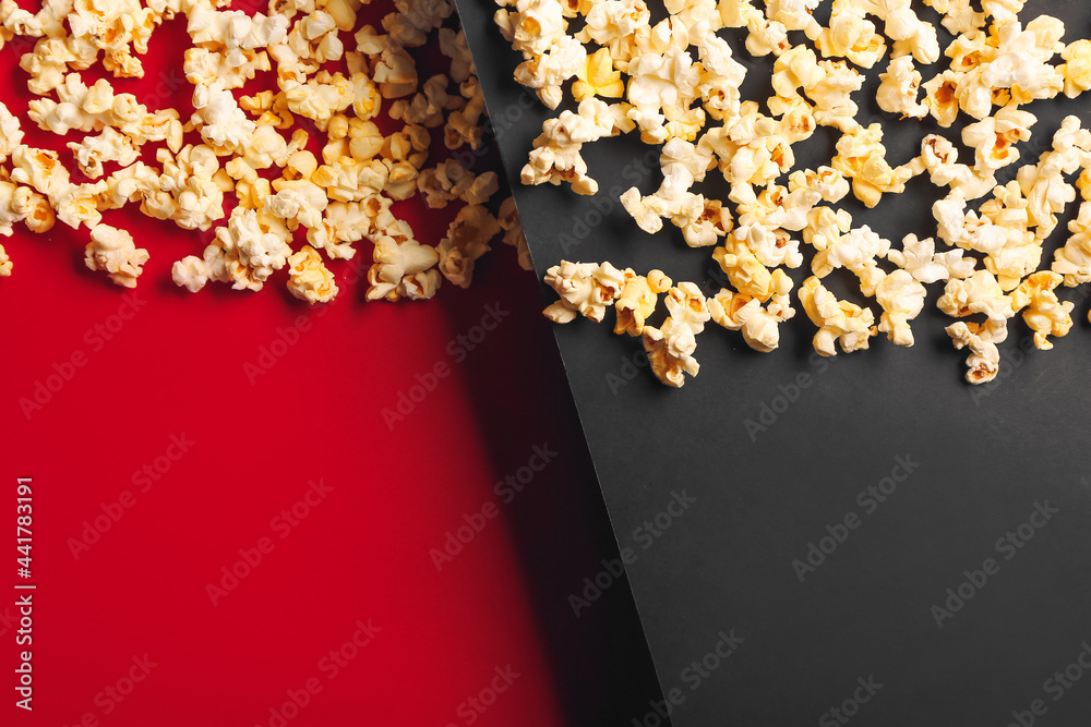 Tasty popcorn on color background