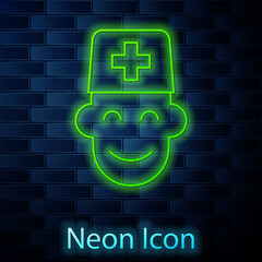 Poster - Glowing neon line Male doctor icon isolated on brick wall background. Vector