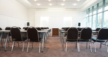 Empty Chairs Arranged In Meeting Room