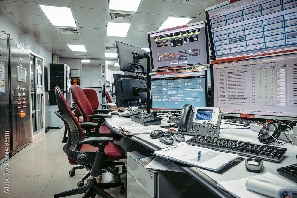 In the System Monitoring Room or control room Work on many monitor ...