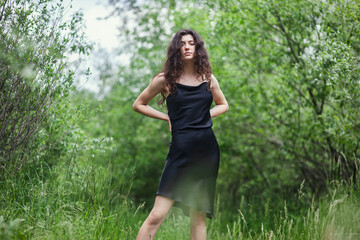 Portrait of a beautiful walking woman on nature