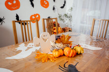 Wooden Dining Table Decorated For Halloween Party