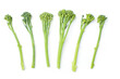 Raw broccolini at the row on white background