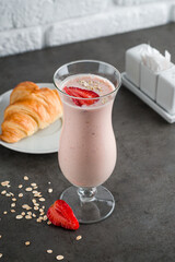 Canvas Print - Fresh strawberry milkshake with strawberry slice