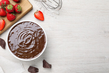 Wall Mural - Delicious chocolate cream and strawberries on white wooden table, flat lay