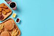 © New Africa - Different fast food on turquoise background, flat lay. Space for text