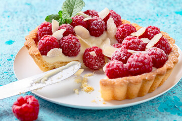 Wall Mural - Homemade shortbread pastry with cream and raspberries.