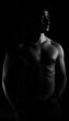 © Juan - Man posing naked torso with black background