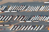 Fototapeta Most - Trucks parked in the parking lot. Directely above.