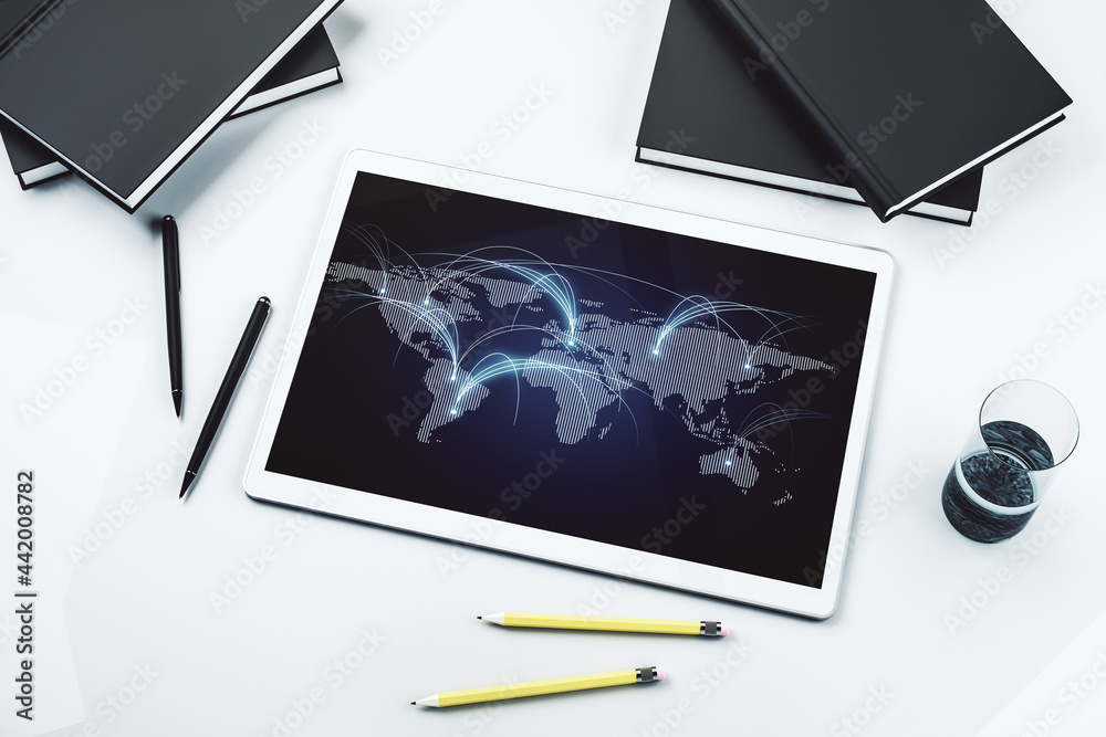 Top view of modern digital tablet monitor with abstract world map with ...
