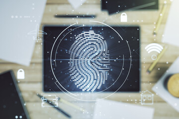 Fototapete - Multi exposure of creative fingerprint hologram and digital tablet on background, top view, personal biometric data concept
