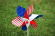 Red, White and Blue Fourth of July  pinwheel in the lawn