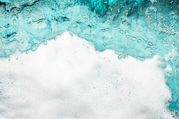 Wall Mural - Blue sea water white foam texture background closeup, foamy ocean wave pattern, aqua bubbles surface, swimming pool backdrop, abstract summer sunny beach wallpaper, decorative frame border, copy space