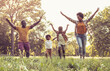 © liderina - African American family having fun outdoors.