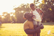 © liderina - African American father and son in nature.