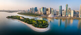Fototapeta Miasto - Sharjah aerial panorama above Al Noor island and mosque and downtown rising above Khalid lake