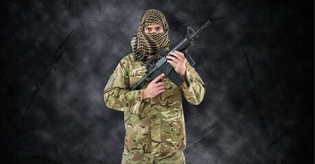 Poster - Composition of male soldier wearing keffiyeh, holding gun, against smoke on black