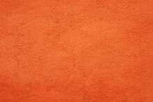 Orange Wall Background With Rustic Plaster Texture.