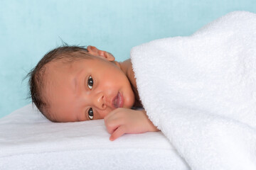 Wall Mural - Innocent baby under towel