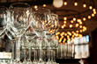 © Наталья Вагнер - empty wine glasses on the background of bokeh from chandeliers in the restaurant