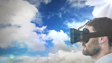 Poster - Animation of man wearing vr headset against sky with clouds
