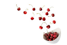 Fresh  Ripe Cherry Berries Falling Into Bowl Isolated On White Background.