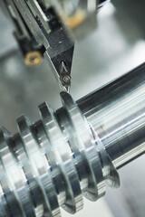 Canvas Print - metal cutting on CNC lathe machine. metal working industry